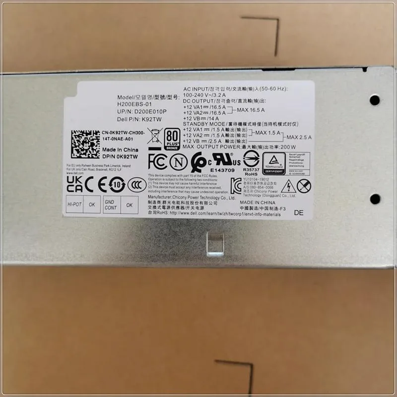 Compact silver SFF power supply with 6-pin connector visible