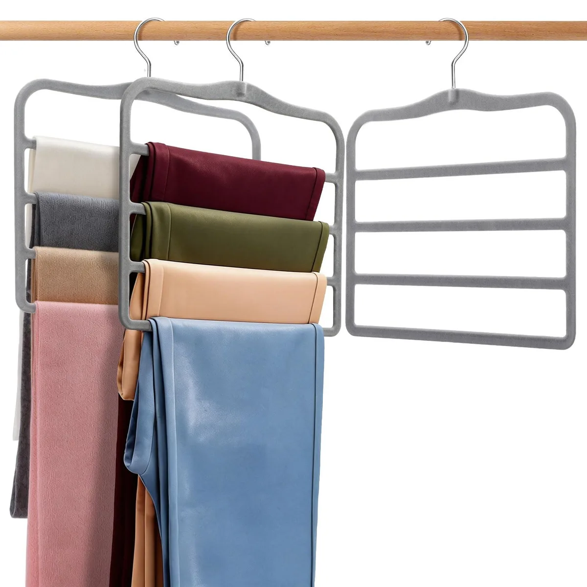 Two grey velvet multi-tier hangers with rotating hooks