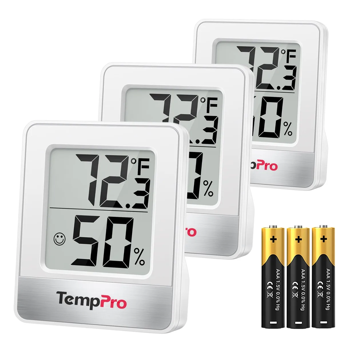 Three white digital thermometers with LCD displays showing temperature humidity and comfort icons