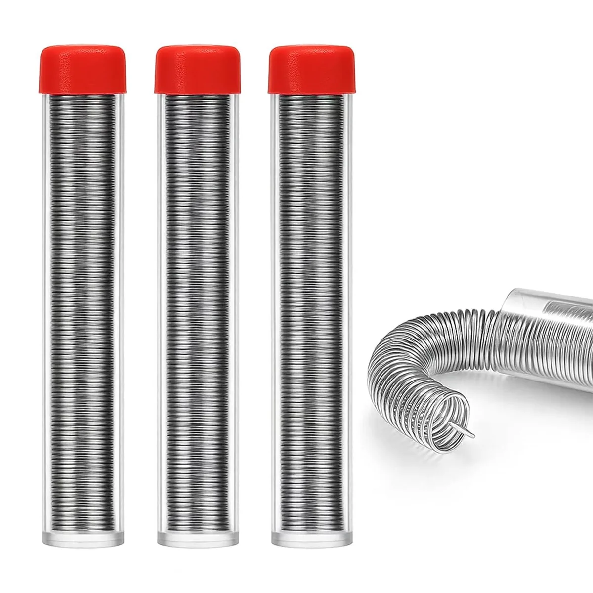 Three small spools of silver-grey solder wire on a light surface