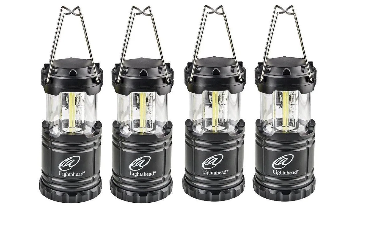 Four black collapsible LED lanterns with stainless steel handles