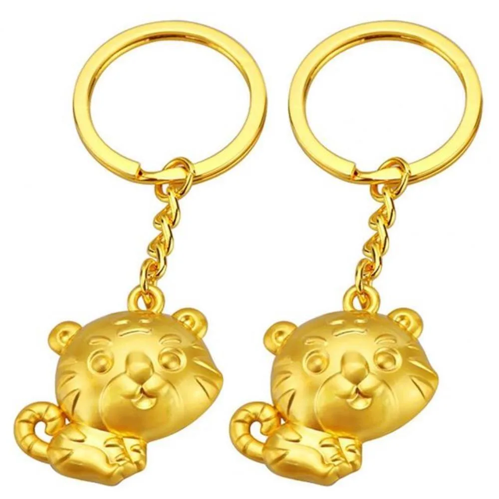 Ruth's sister Ruth's sister 2pcs golden lucky tiger bag pendants metal 3.2cm 2022 — product photo