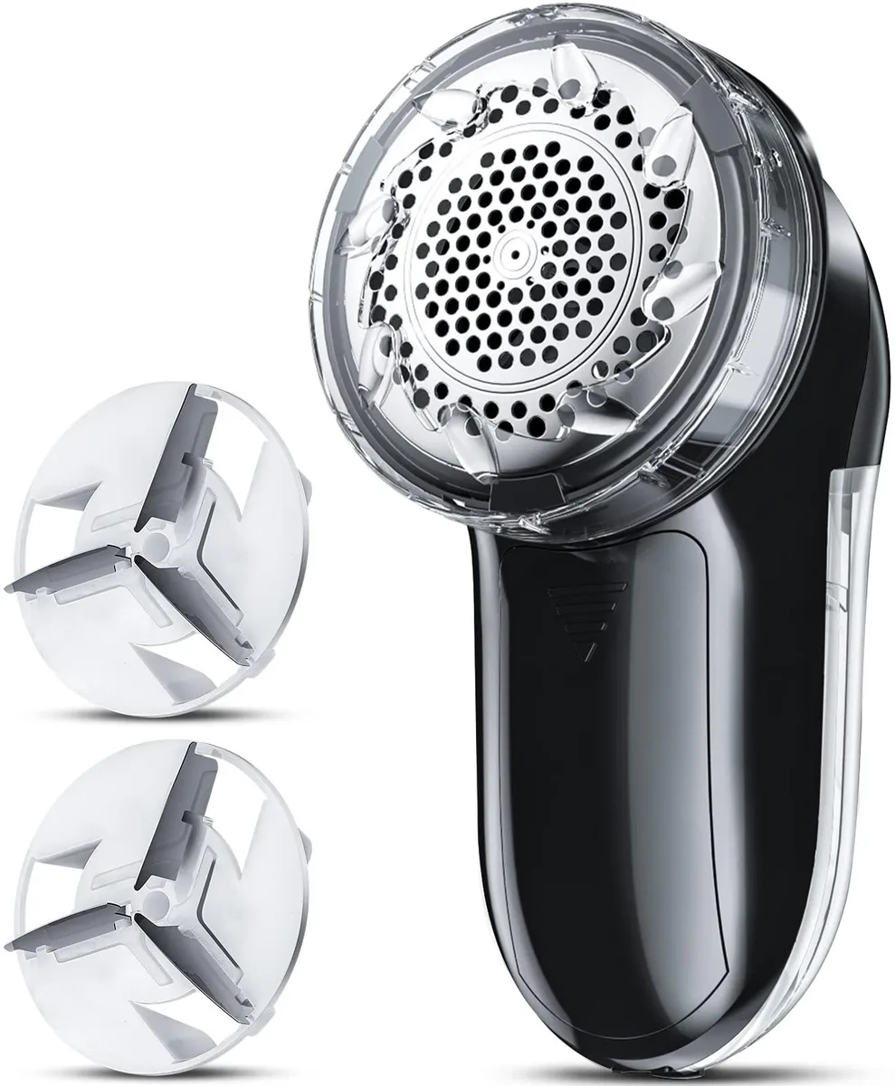 Compact black fabric shaver with honeycomb mesh head and AC adapter