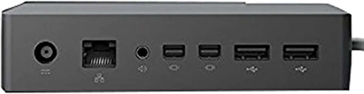 Black rectangular docking station with Surface Connect cable attached