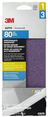 Five rectangular sandpaper sheets in a pack, light brown abrasive surface on backing material