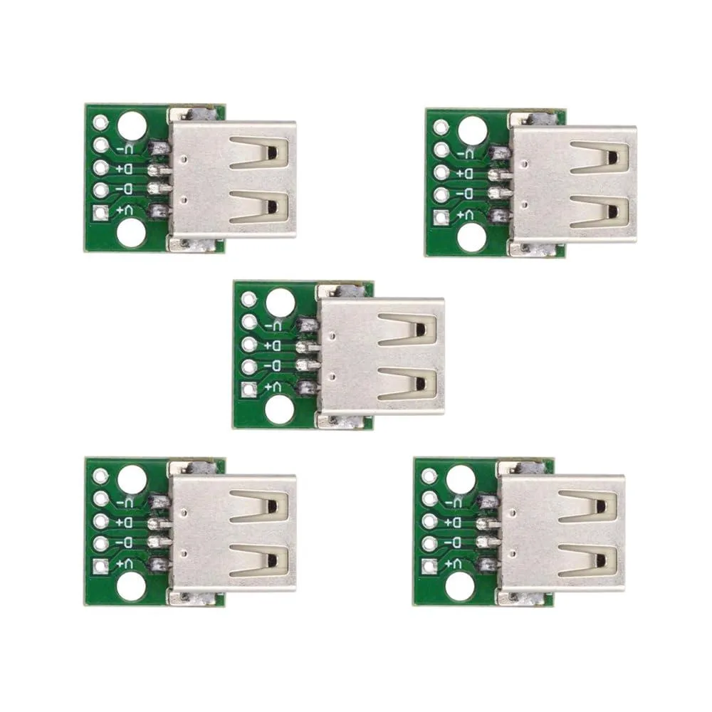 Five rectangular USB Type-A female sockets with silver metal shells and black plastic inserts, PCB through-hole pins visible underneath