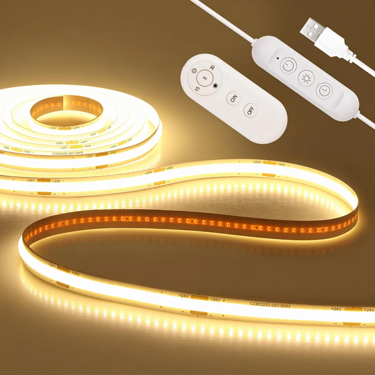 A 2 metre flexible white LED strip on a reel with a USB plug and a small remote control