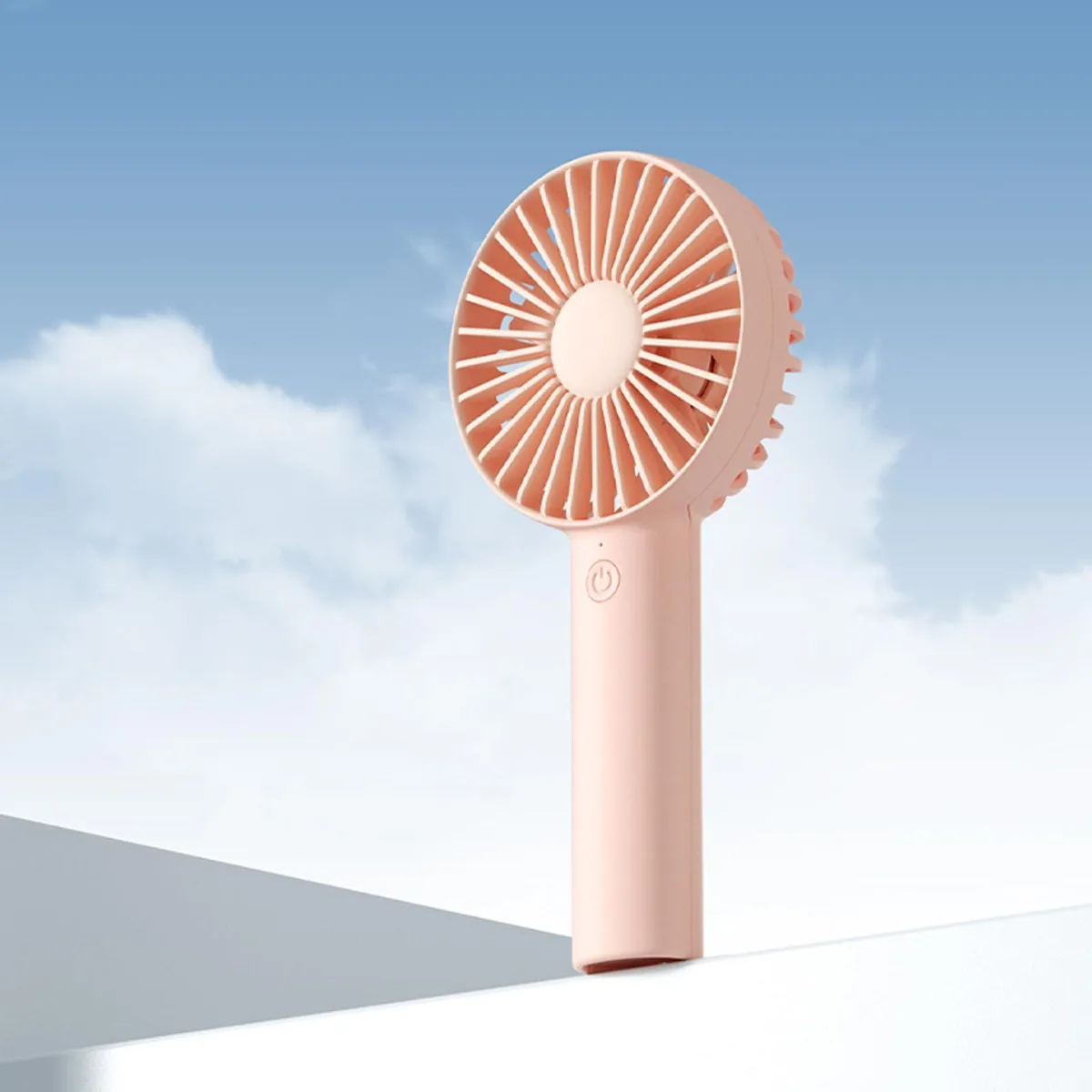 Pink handheld fan, rectangular with rounded edges, matte finish, Type-C port visible