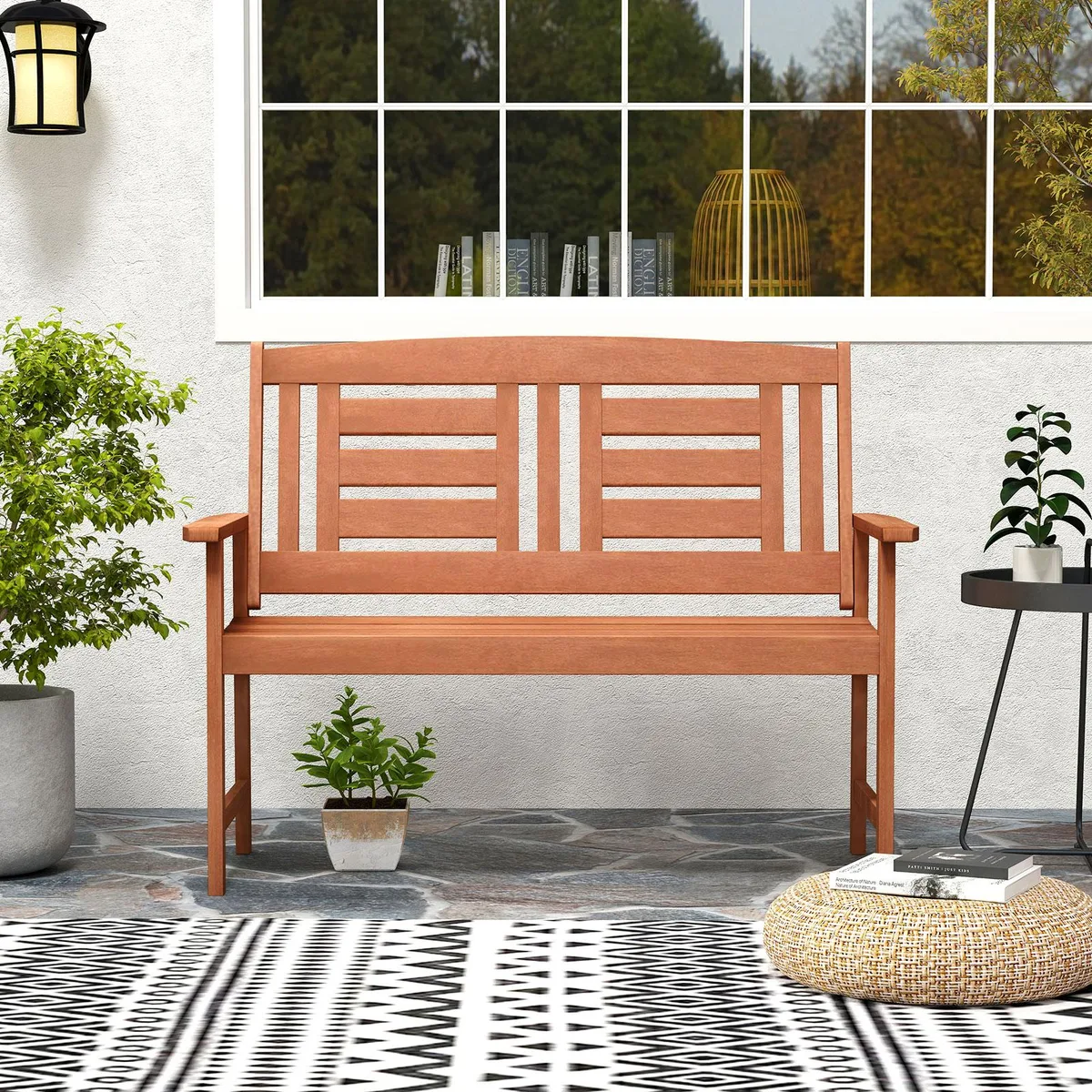 Solid wood loveseat with inclined backrest and slatted seat in teak finish