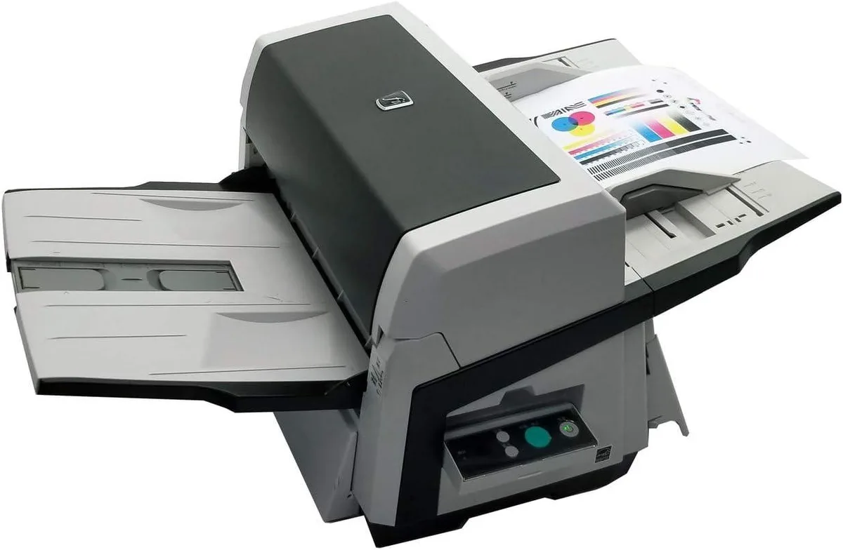 Rectangular document scanner, light grey plastic, front paper feed tray, top output tray, control panel with buttons
