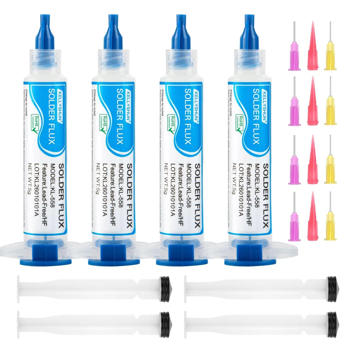 Four small white tubes of soldering flux paste in a row