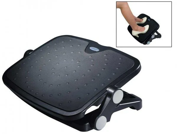 Black plastic footrest with textured platform and rubber feet, rectangular shape, low profile