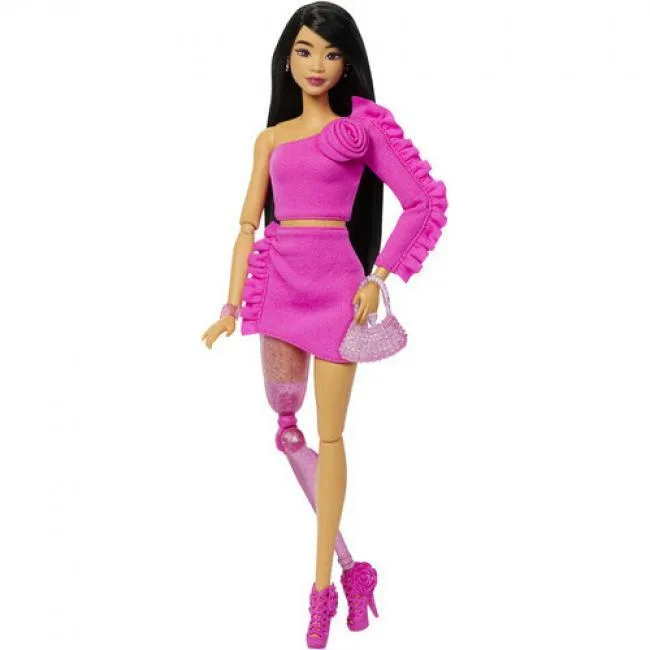 Barbie Barbie HYV26 doll with black hair, glittery prosthetic leg, pink top and skirt set, accessories — product photo