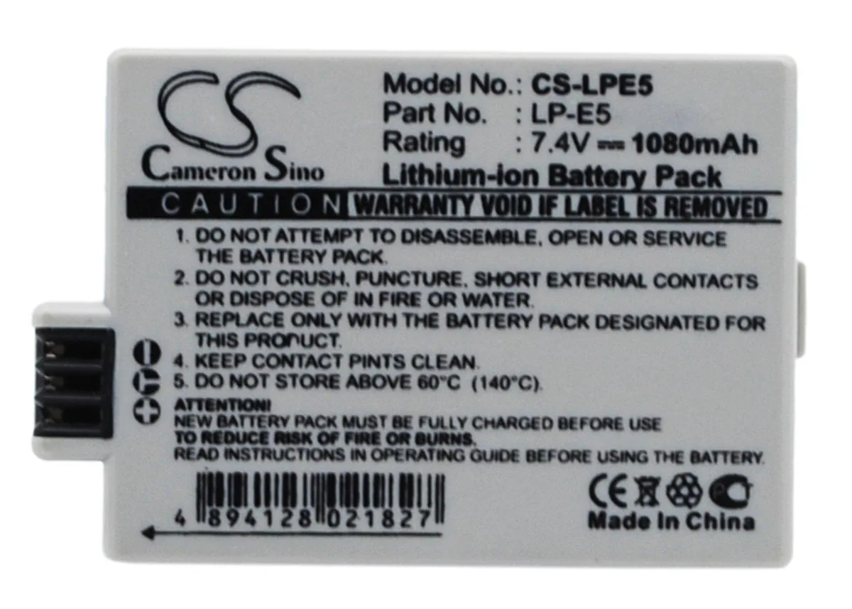 Rectangular lithium-ion camera battery, dark grey finish, gold contacts visible