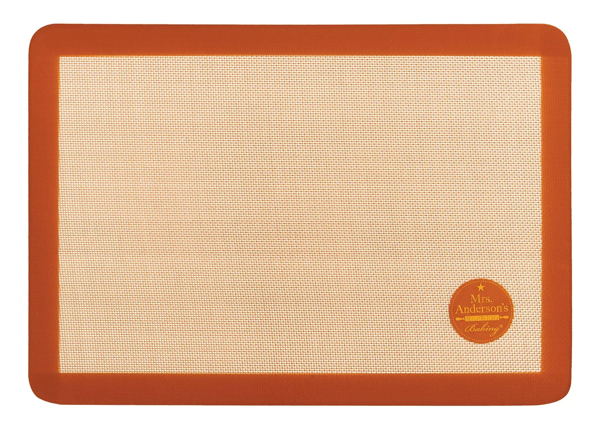 Rectangular silicone baking mat with reinforced fiberglass core, light-coloured non-stick surface, flexible and reusable
