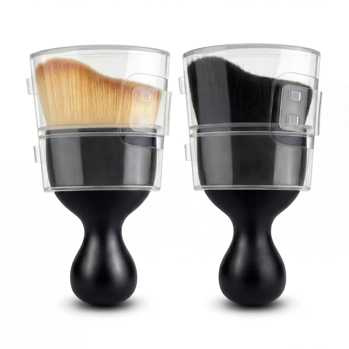 Two black and yellow interior detailing brushes with soft synthetic bristles and ergonomic handles