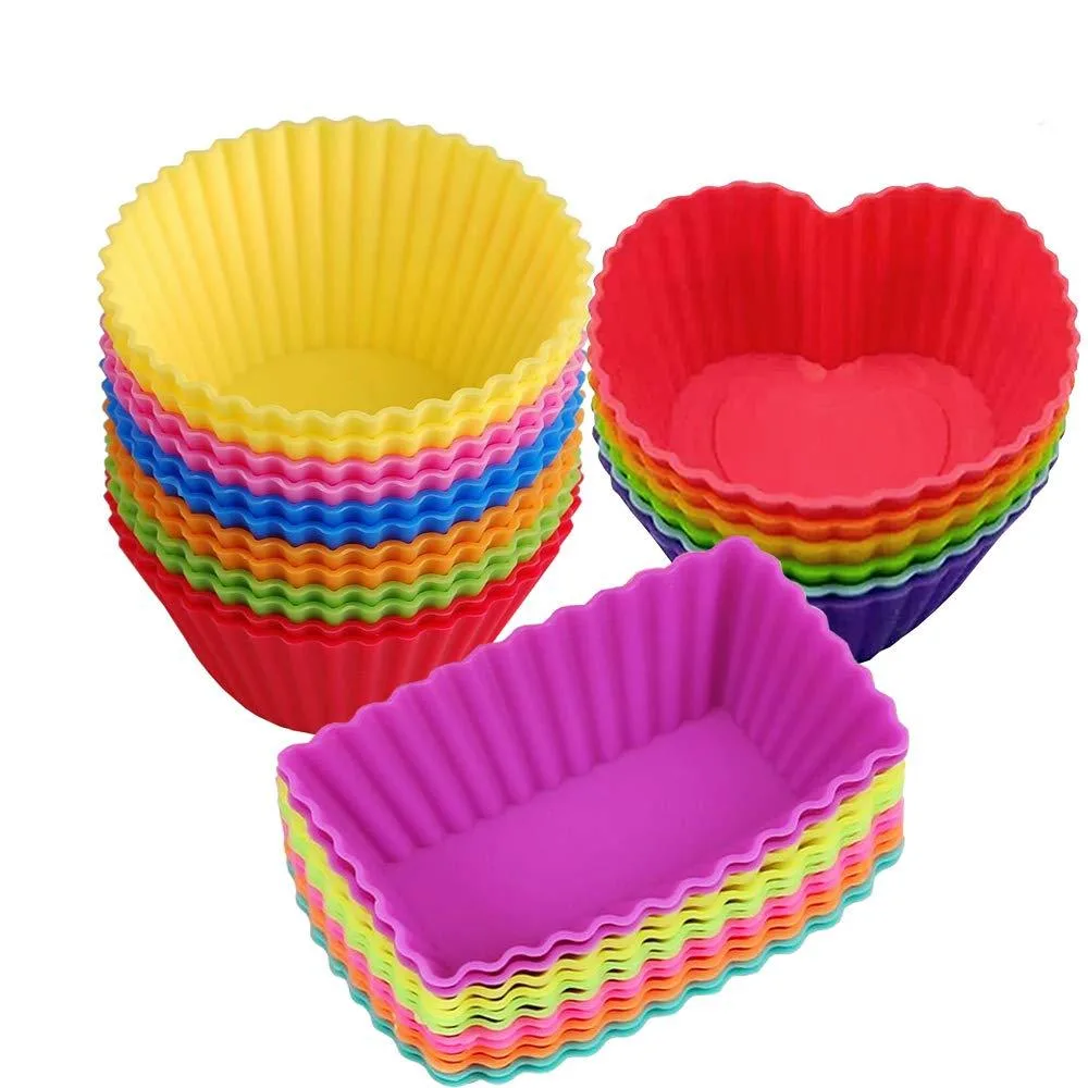 Thirty-six silicone baking cups in heart rectangle and round shapes in a storage container