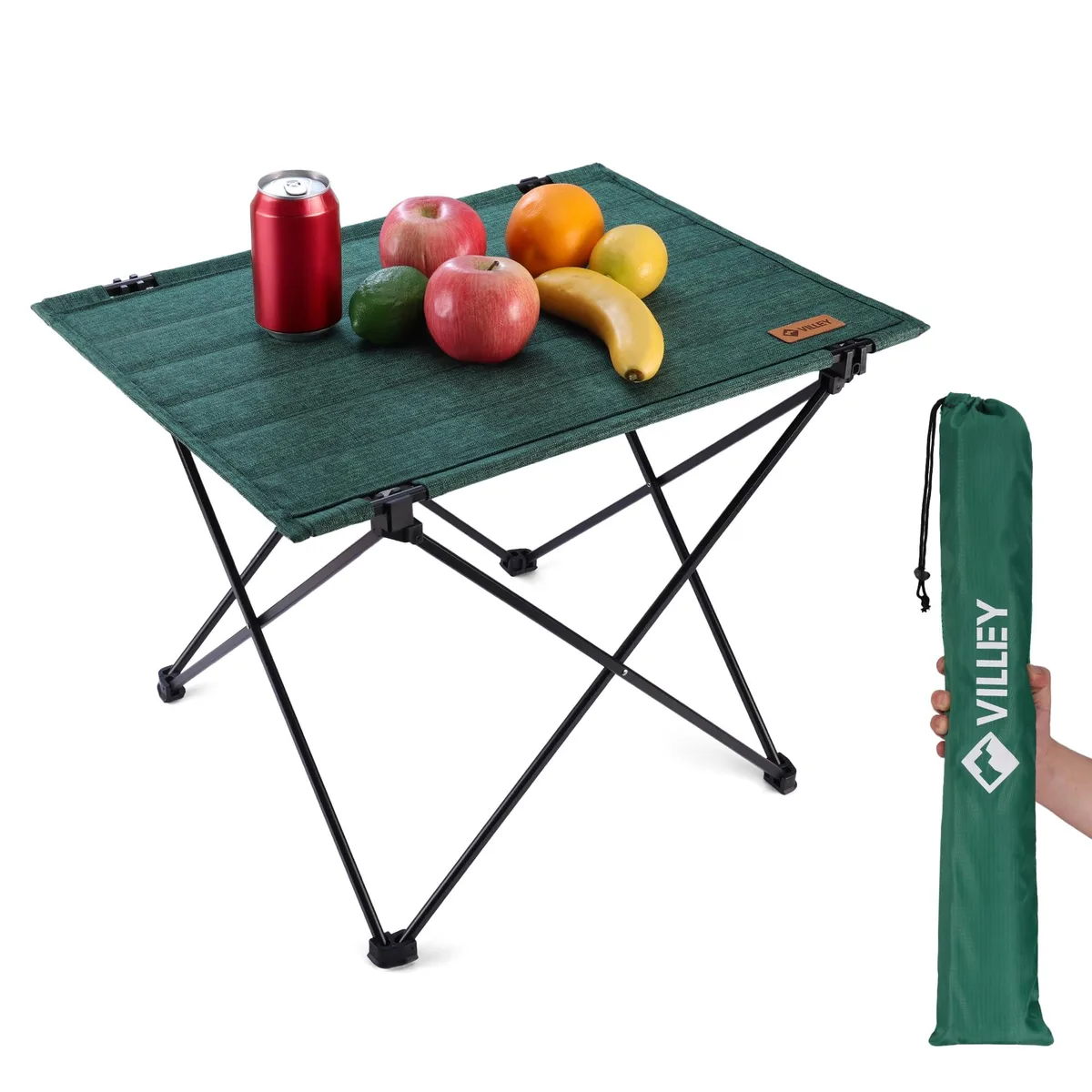 Black folding camping table with aluminum frame and Oxford fabric top, folded flat with carry bag visible