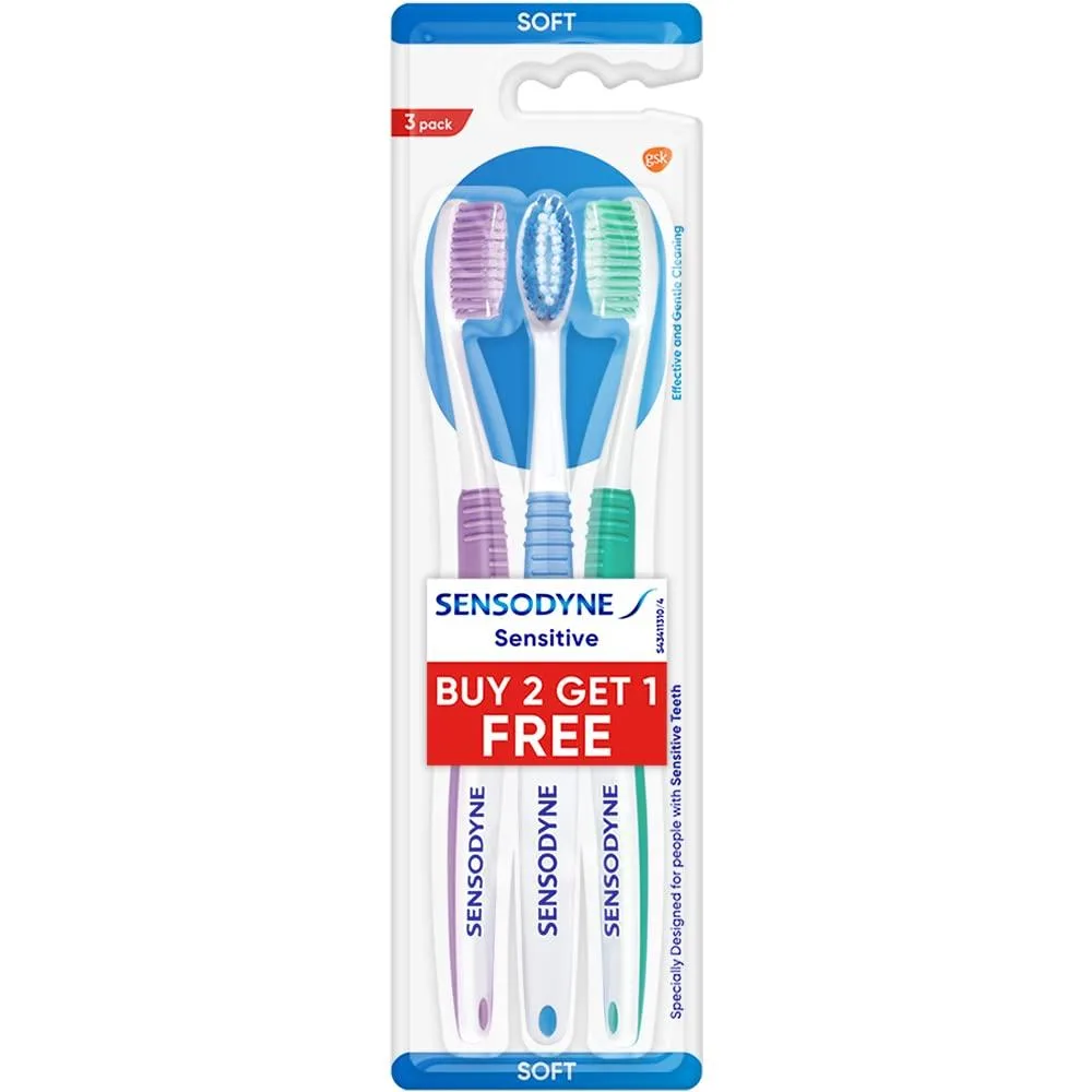 Three soft-bristled manual toothbrushes in assorted colours, plastic handles, compact heads