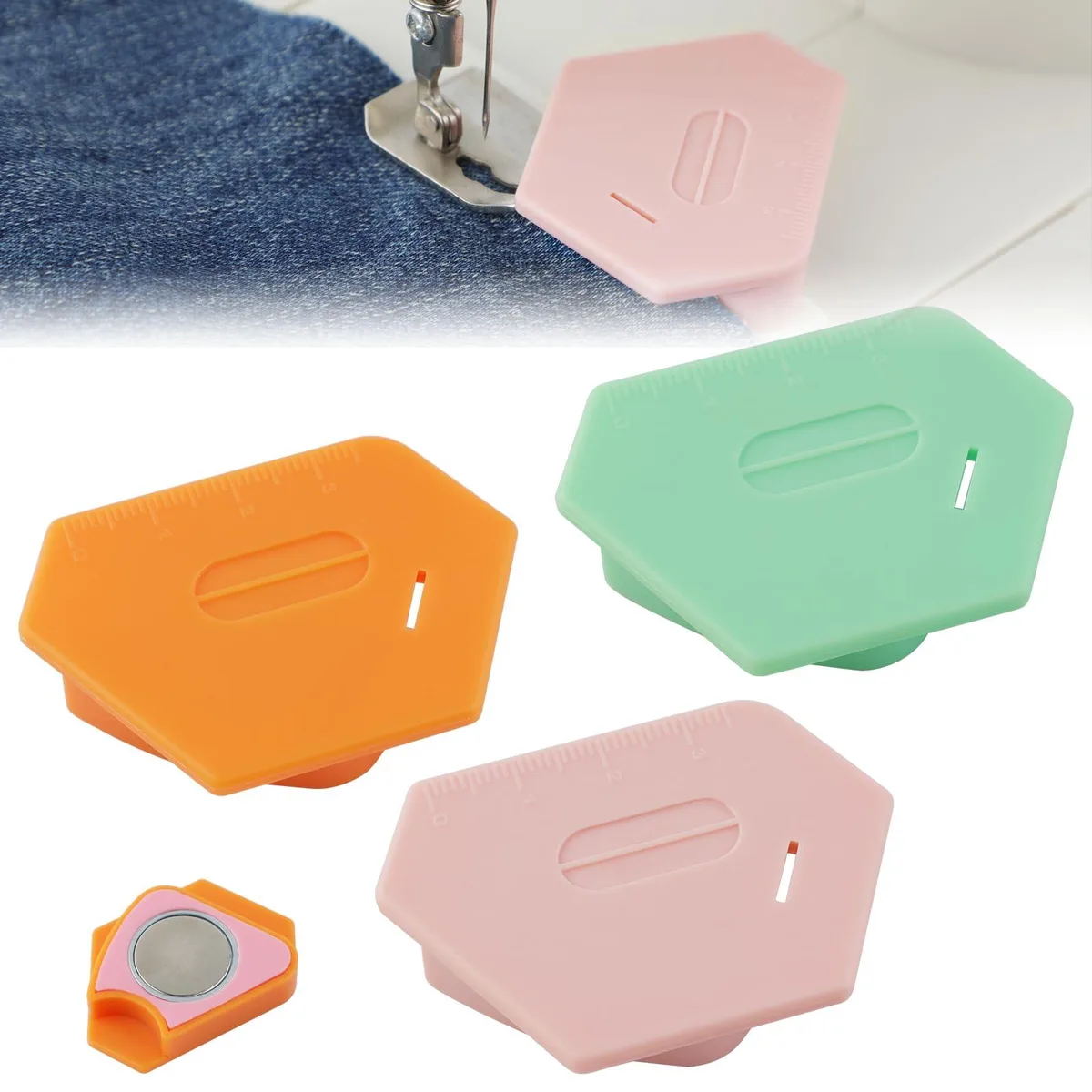 Three small polygonal magnetic seam guides in pink orange and green shown together