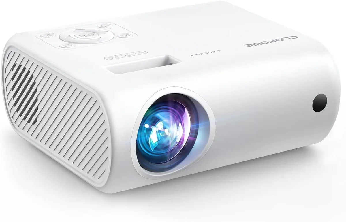 Compact rectangular projector in matte dark finish with carry handle visible