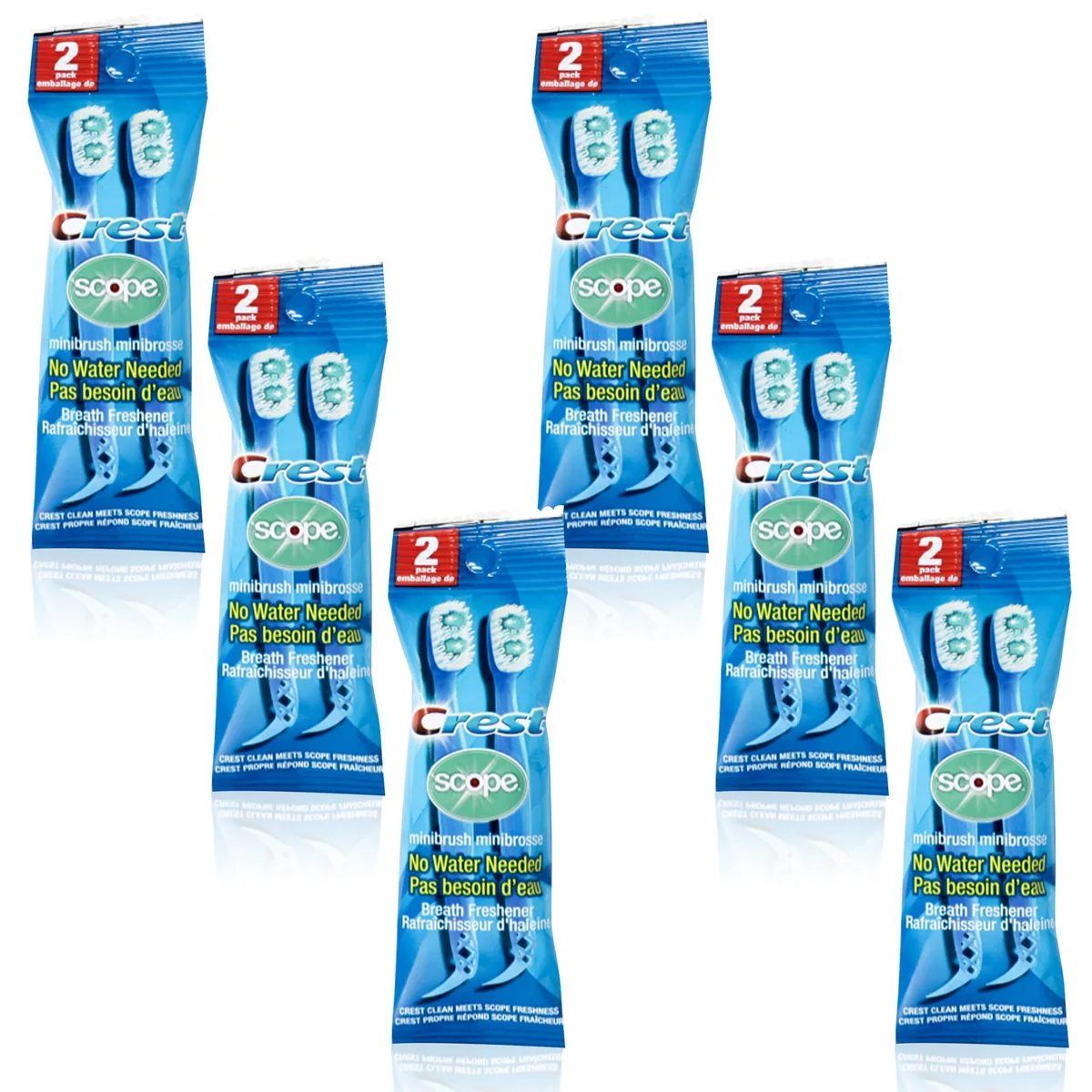 Box of twelve disposable mini toothbrushes with mint bead and interdental pick