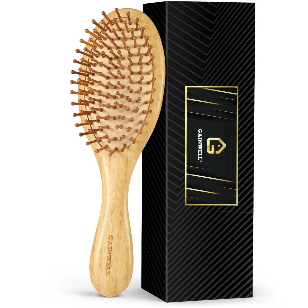 Light brown bamboo paddle hairbrush with rounded pins, ergonomic handle and air vent hole