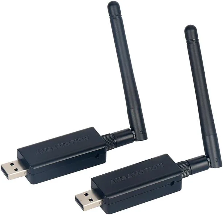 Two small USB dongles with plastic casings and metal connectors