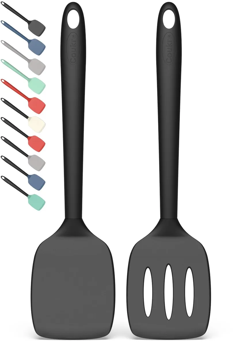 Two black silicone turners, one solid and one slotted, with bamboo handles