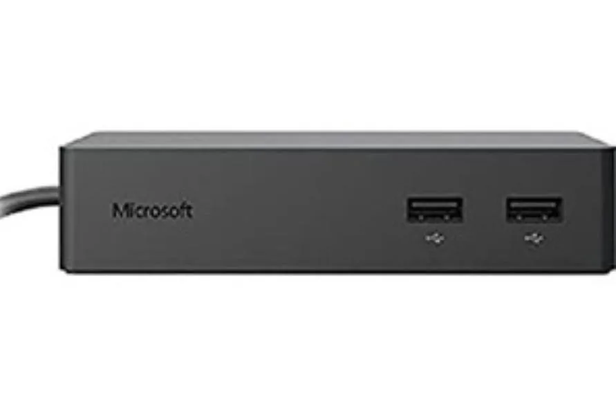Black rectangular docking station with magnetic Surface Connect cable and external power supply