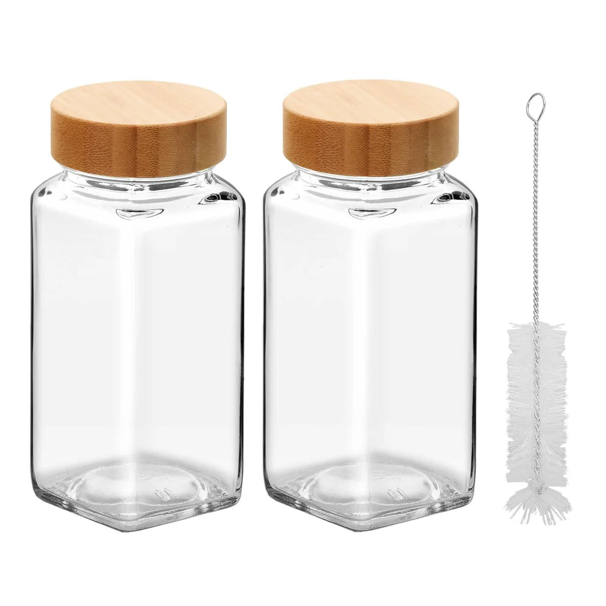 Two square glass spice jars with bamboo lids and shaker tops
