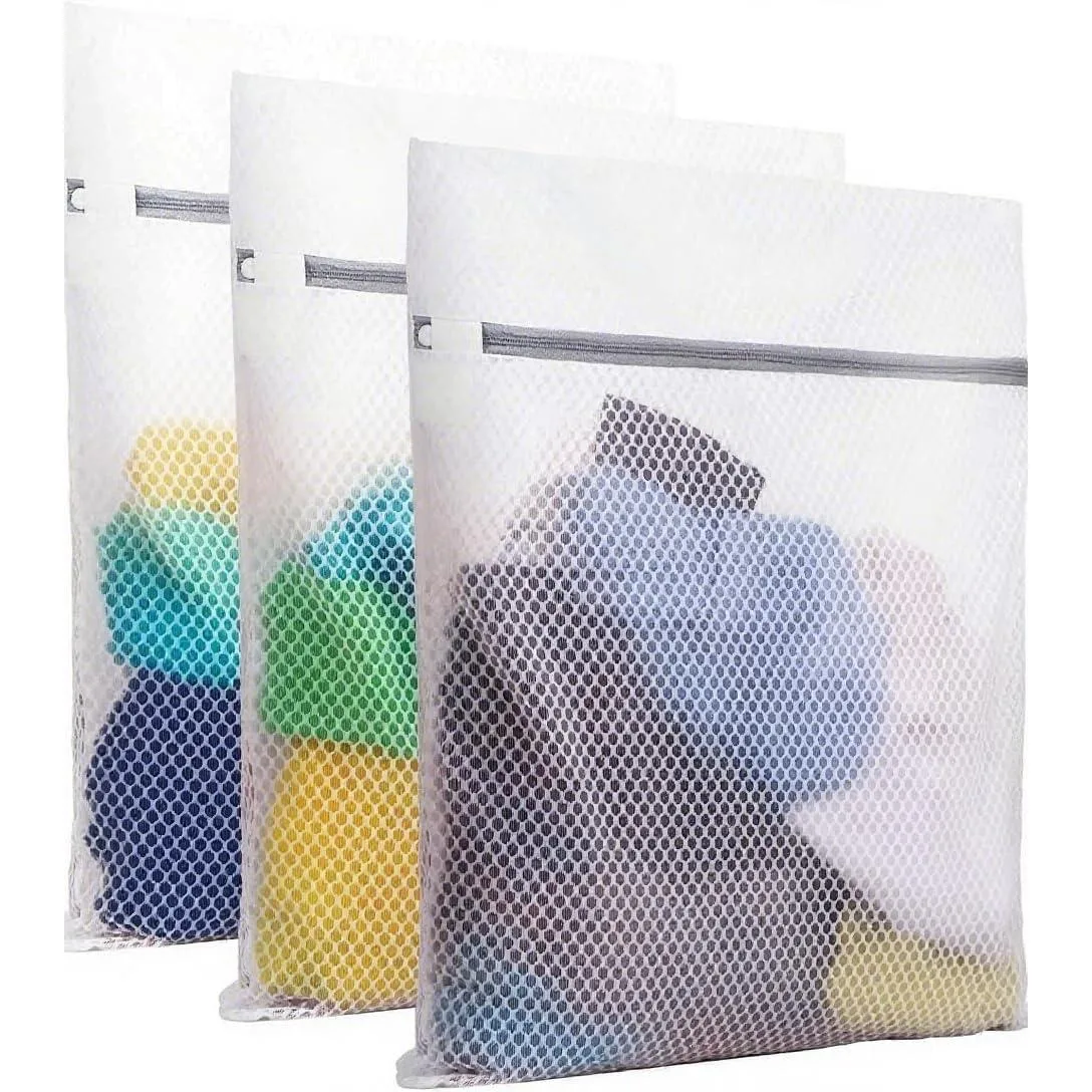Three beige honeycomb mesh laundry bags with zippers, each 16 by 19 inches