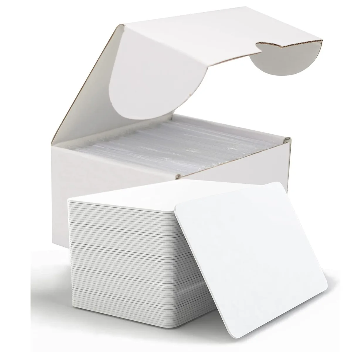 White rectangular PVC cards in a stack, credit-card size, smooth glossy finish
