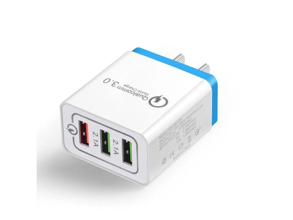 Compact white USB wall charger with three rectangular ports and foldable US prongs