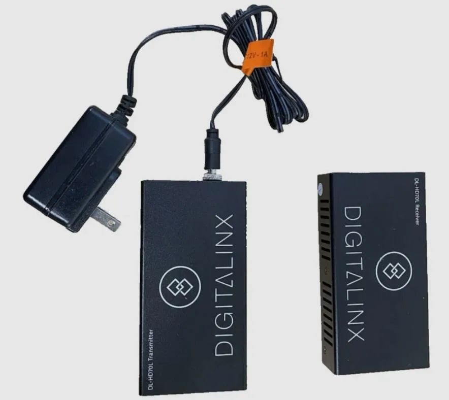 Small black rectangular receiver unit with HDMI and network ports