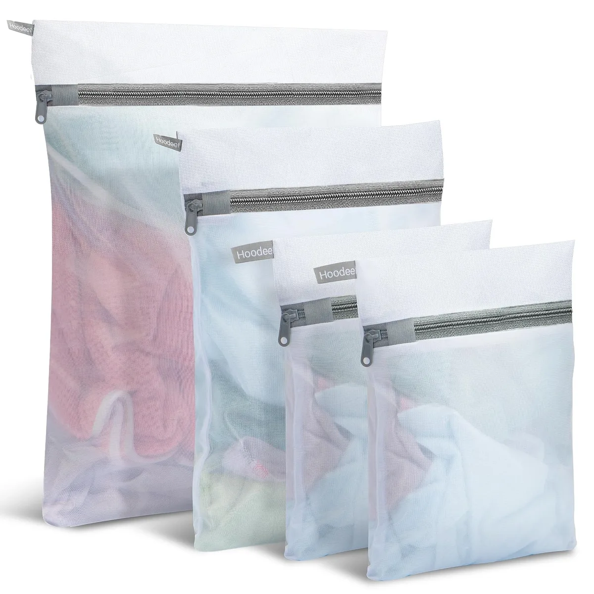 Four beige mesh laundry bags with zip closures, folded flat
