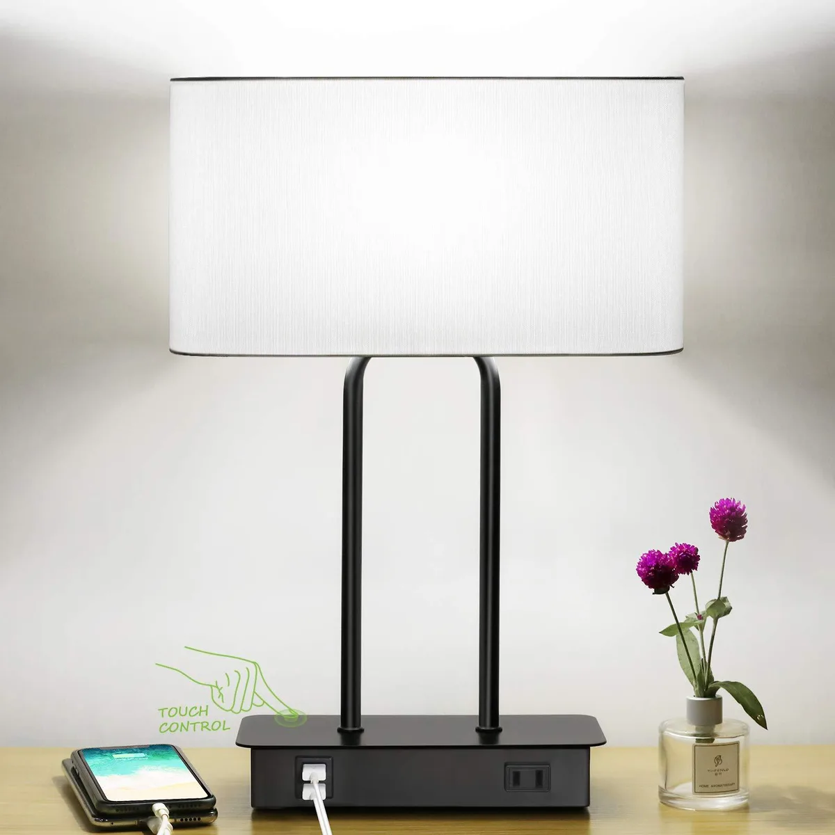 Black metal table lamp with white fabric shade and touch control base, 16 inches tall