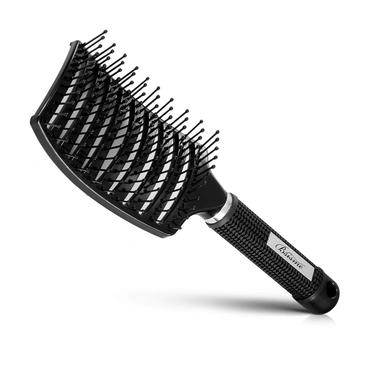 Curved vented detangler brush with nylon bristles, rubber grip handle, magnet and hanging hole