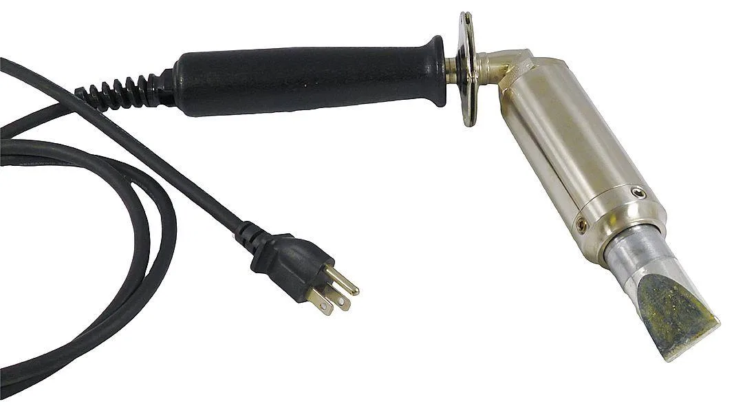 Heavy-duty soldering iron with chisel tip and stand