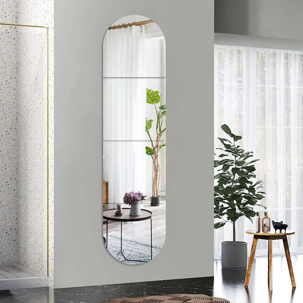 Four square frameless acrylic mirror tiles silver polished finish .2cm thick protective film visible