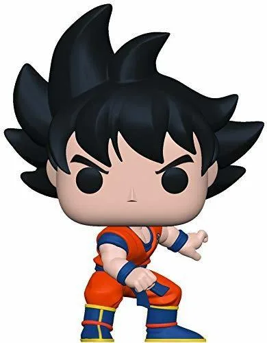 Vinyl Goku figure in orange gi, spiky hair, window box