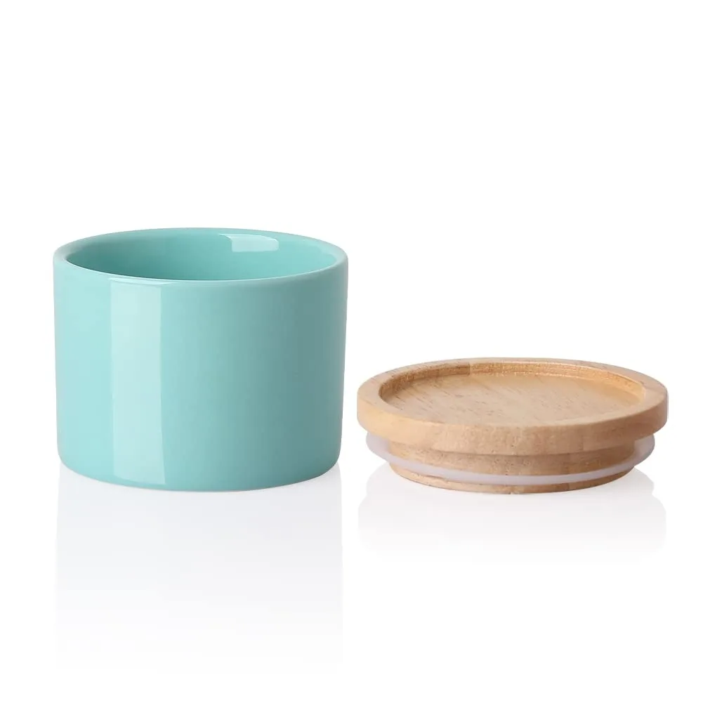 Turquoise ceramic jar with wooden lid, 4.92 in square by 4.53 in high