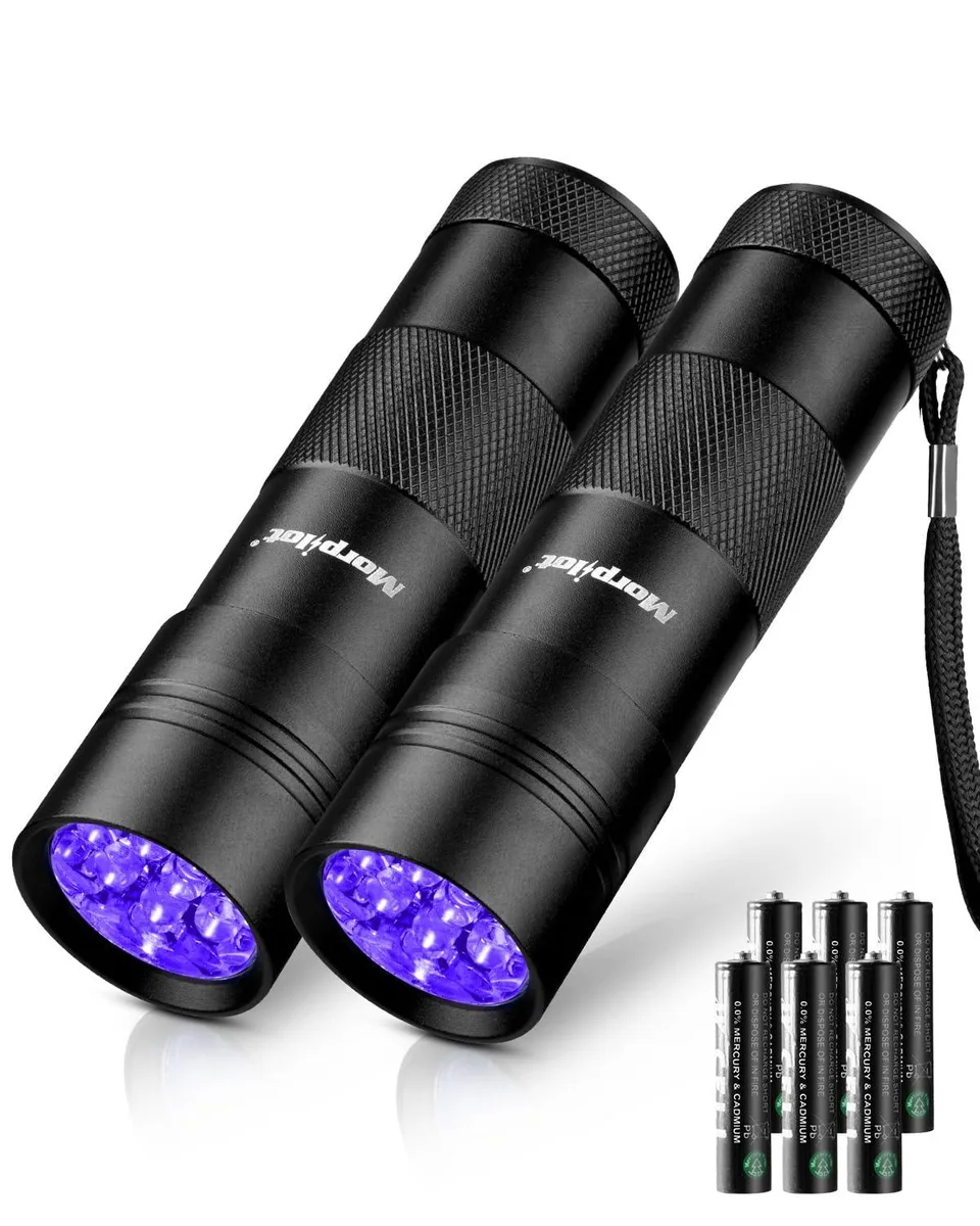 Two compact aluminium UV flashlights with textured grips and wrist straps