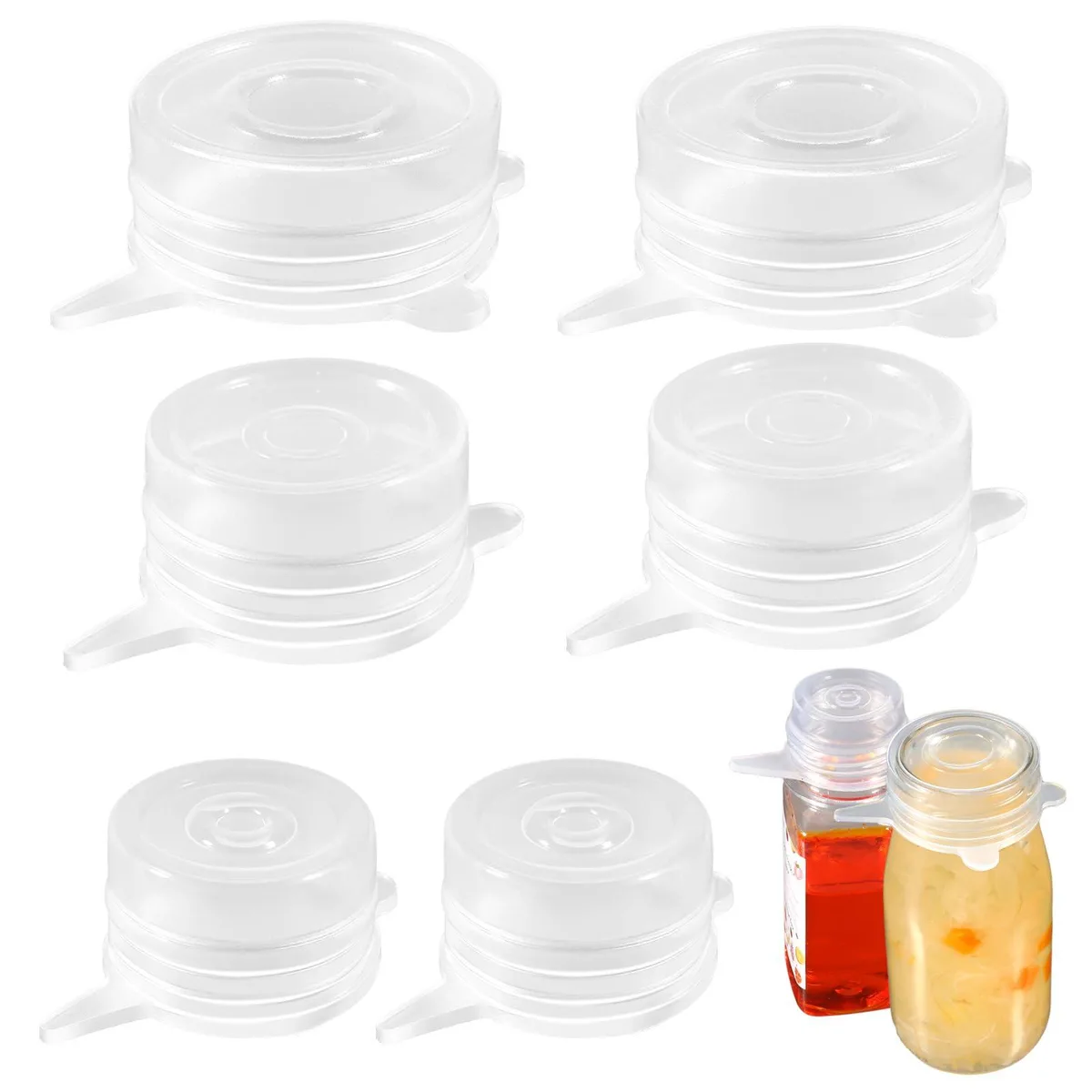 Six clear silicone stretch lids, round, three sizes, stacked
