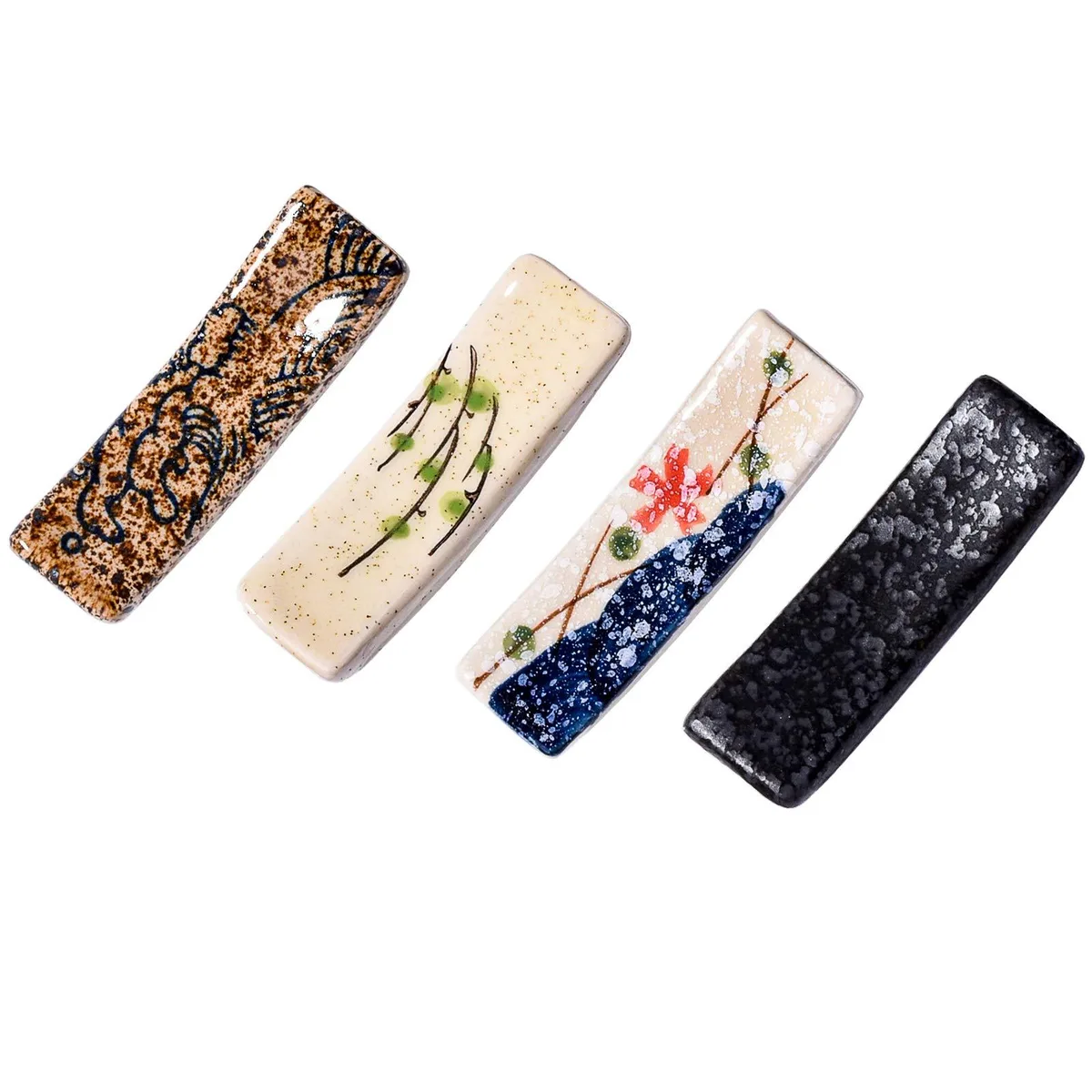 Four black ceramic chopstick rests, each 2.75 by .75 inch, .75 inch high