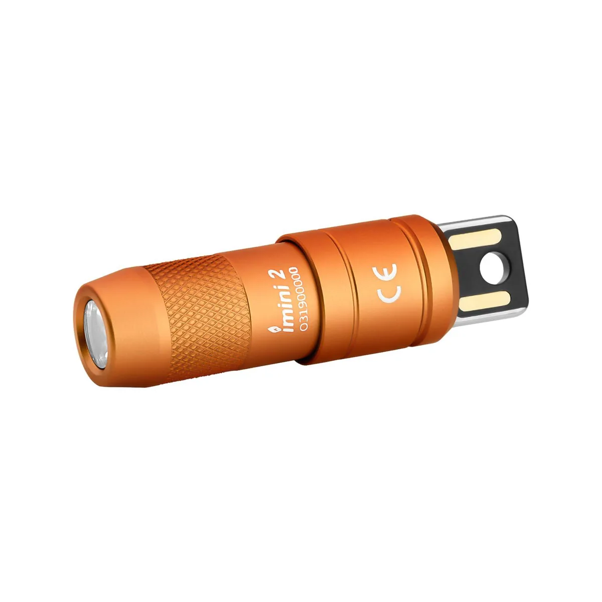 Small orange cylindrical keychain flashlight with magnetic cap and integrated USB plug