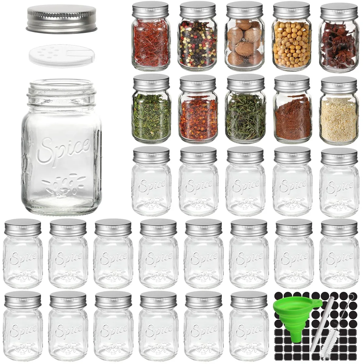 Thirty red round glass spice jars with shaker lids and metal caps on a surface
