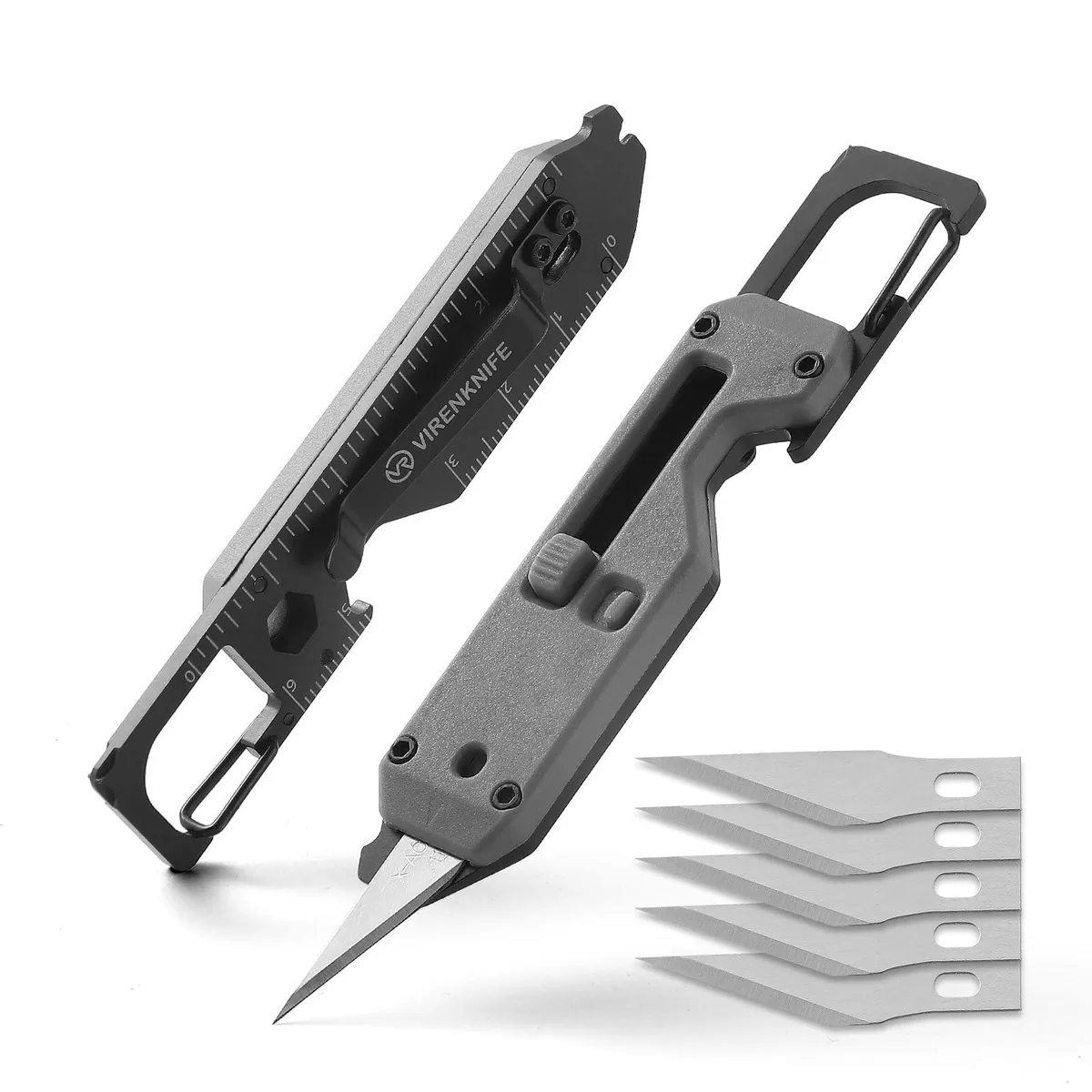 Compact grey multi-tool with retractable blade, carabiner and clip