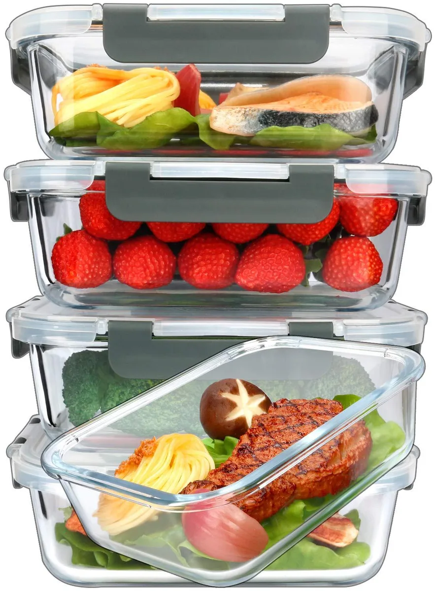 Five rectangular red-lidded glass food containers stacked together