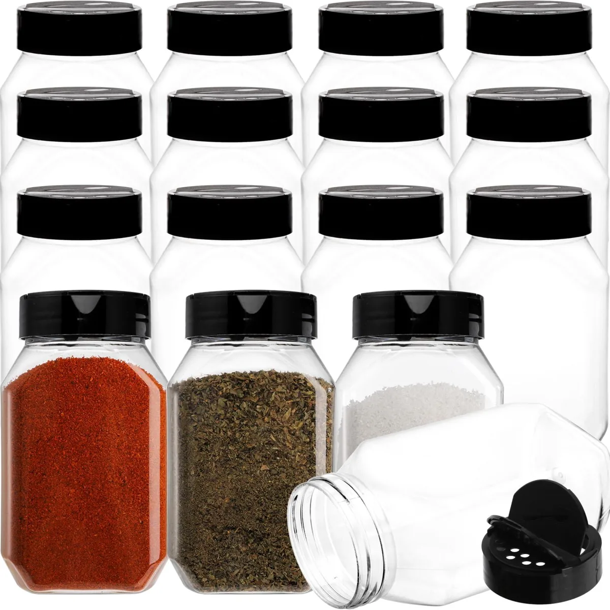 Sixteen tall red plastic jars with black flip-top shaker lids standing in a row